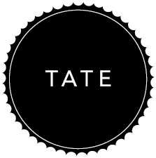 Logo of Tate with a black circular background and white text.